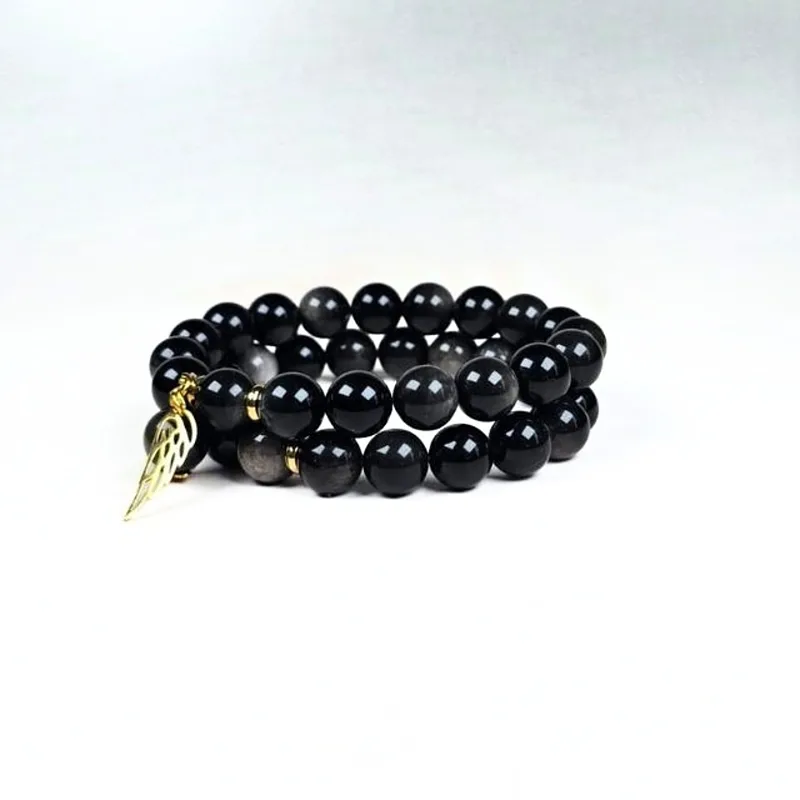 Melnā obsidiāna ar sudraba spīdumu rokassprādzes